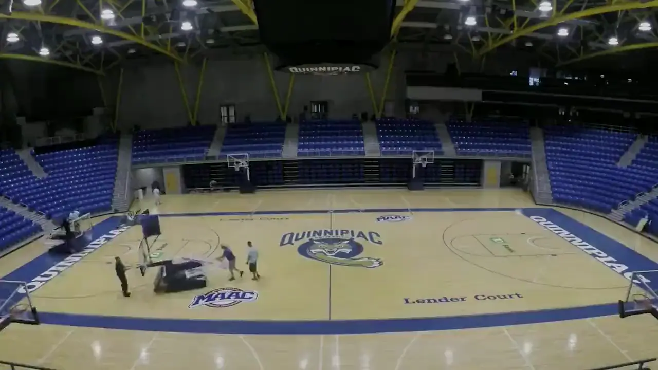 Maple gym floor time-lapse by J and J Gym Floors: sanding, painting game lines and logos, and finishing the floor to a high gloss