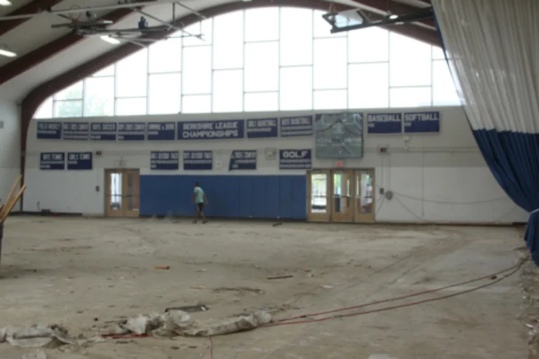 Old gym floor removal at Litchfield High School, CT, stripped down to the slab